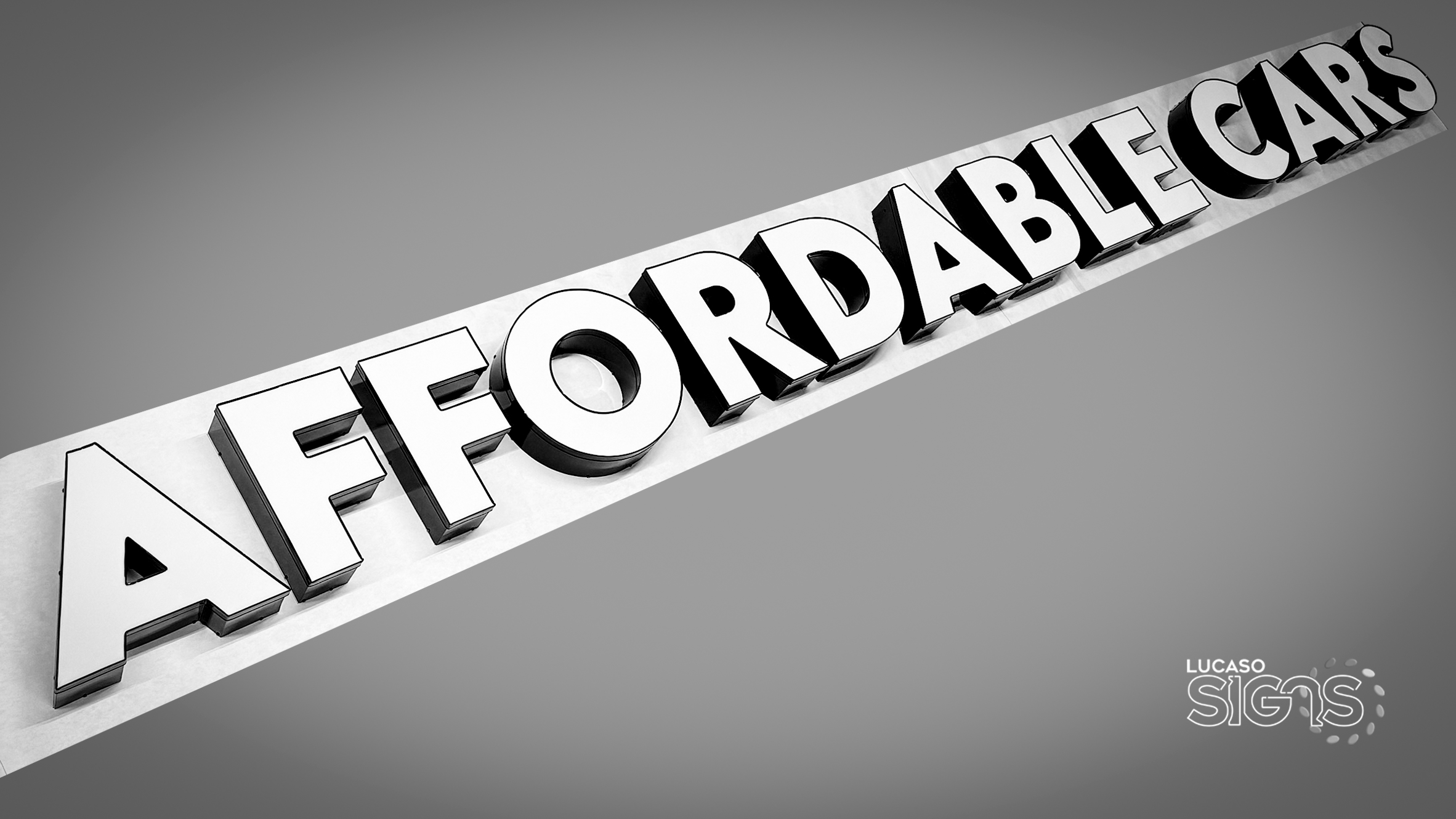 Car Delaer business sign in channel letters by Lucaso Signs