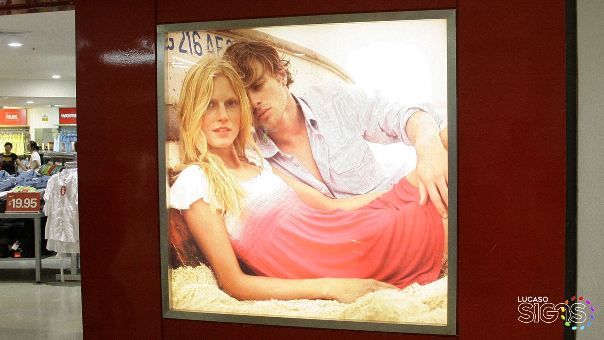 Retail store illuminated light box display with changeable translucent graphic panel by Lucaso Signs