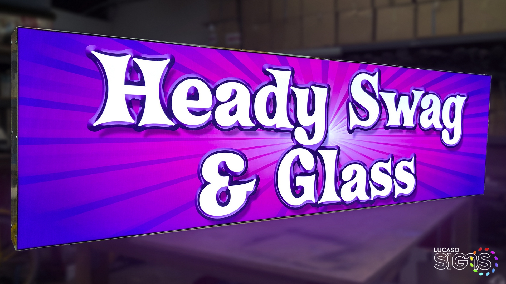 Custom illuminated light box sign with vibrant purple background and bold white lettering for Heady Swag &amp; Glass by Lucaso Signs