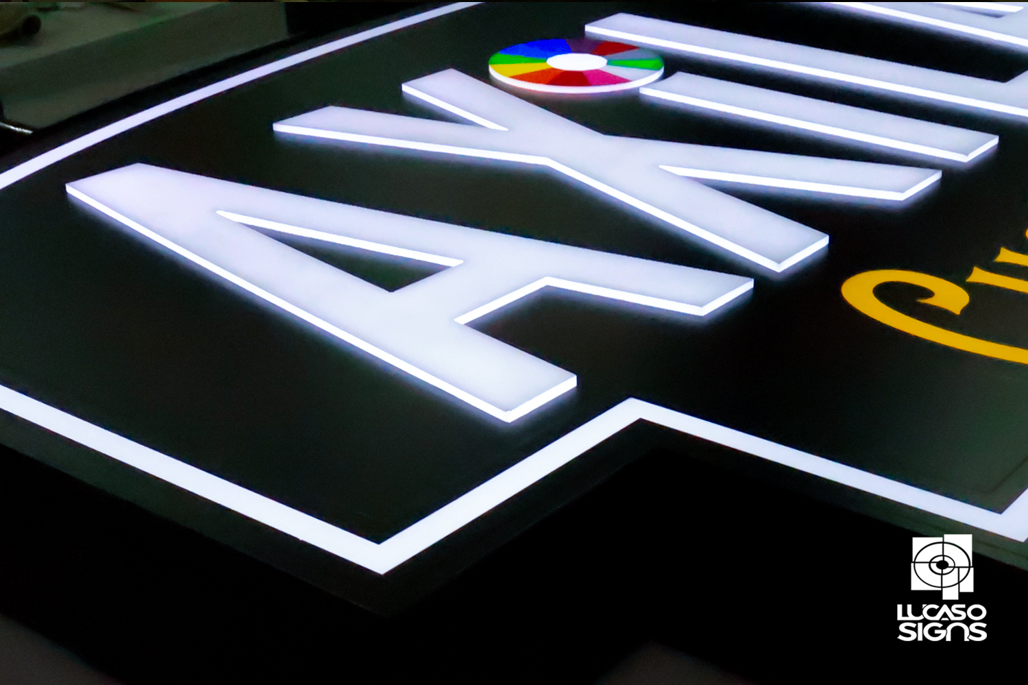 White Push Through on black background by Lucaso Signs