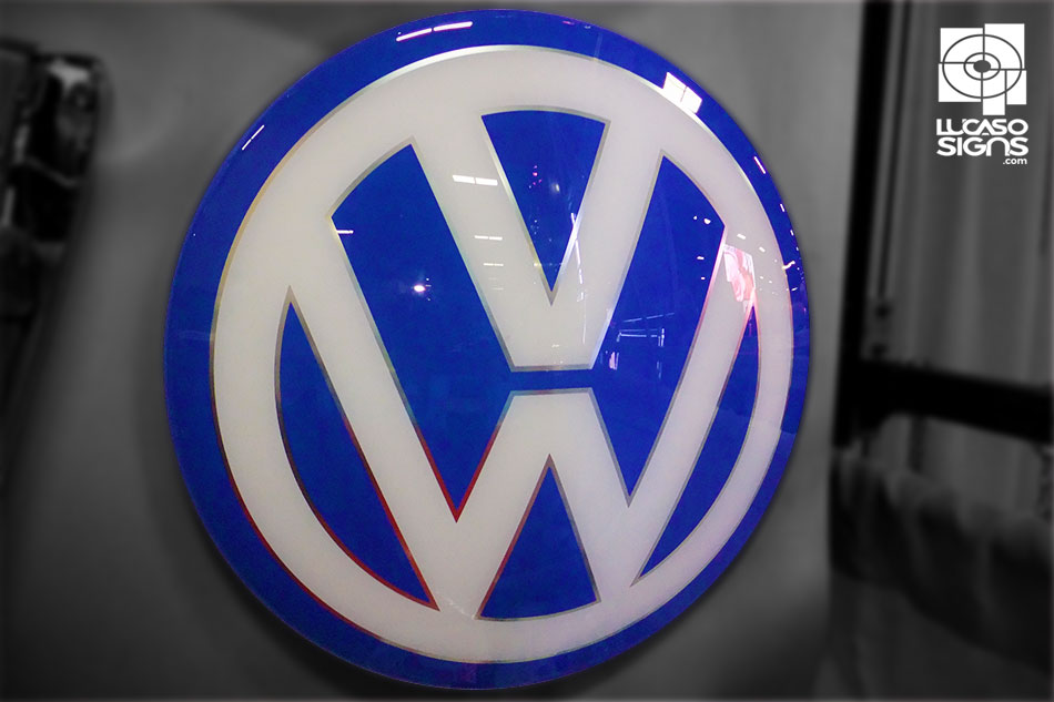 Blue and white thermoformed 3D Volkswagen logo emblem with glossy finish, custom automotive branding by Lucaso Signs
